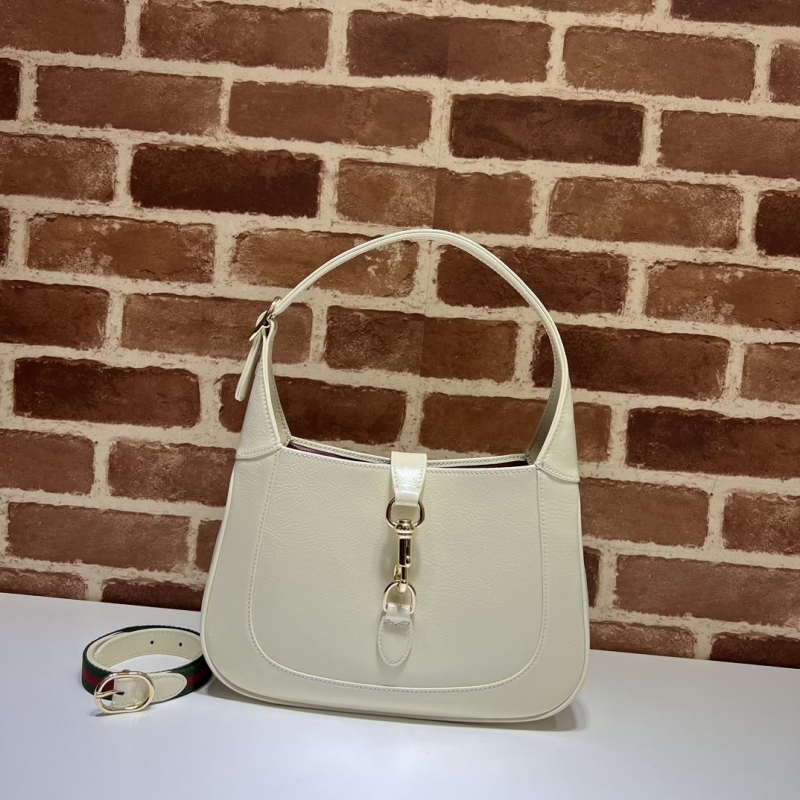 G*u*i top handle bags